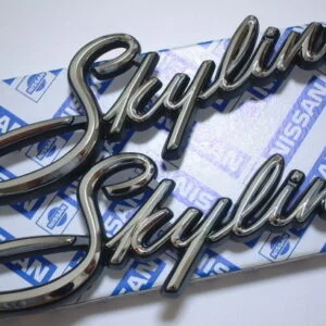 OEM Skyline C10 2D "Skyline" Fender Emblem Set of 2